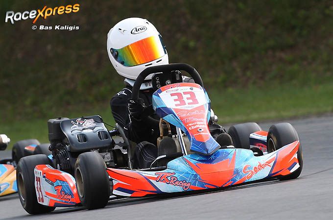 Hendrik Kielstra met nummer 33 naar podium